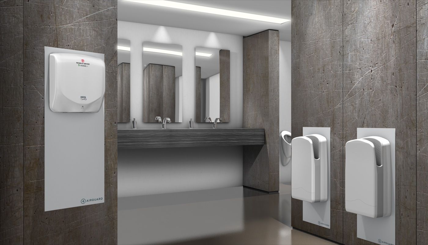 AirGuard white backplate behind a wall-mounted hand dryer in a commercial washroom